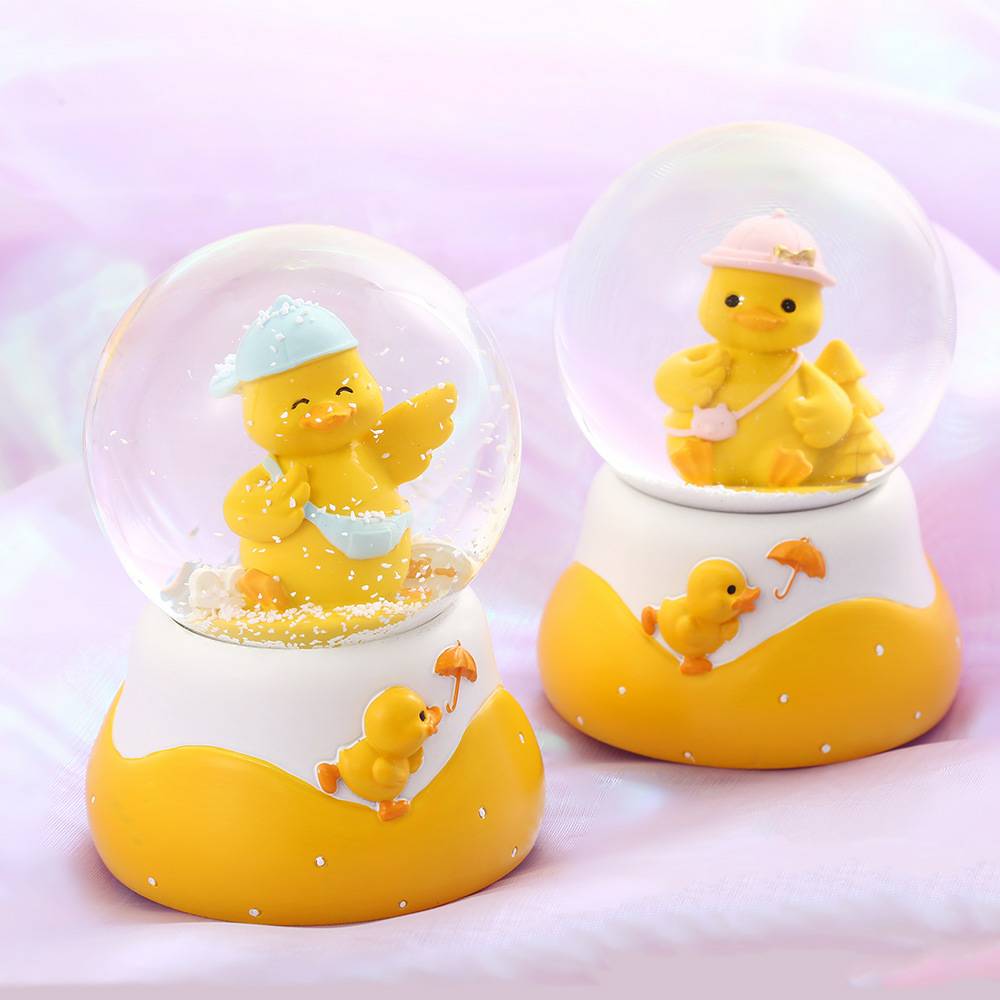 Small doll cartoon couple with crystal ball with light