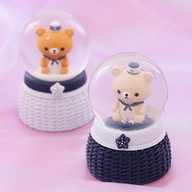 Small doll cartoon couple with crystal ball with light